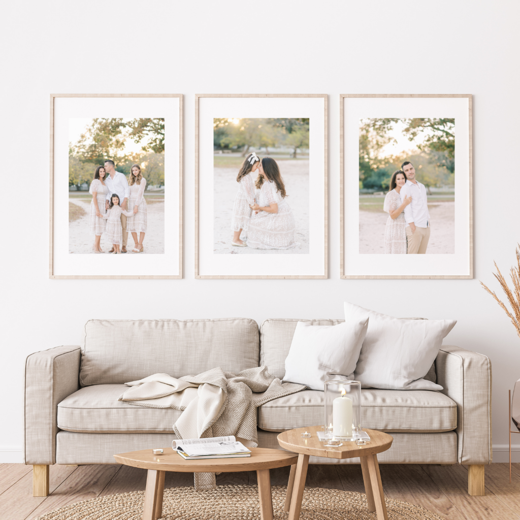 Framed and matted gallery wall of family photos in a neutral and white home