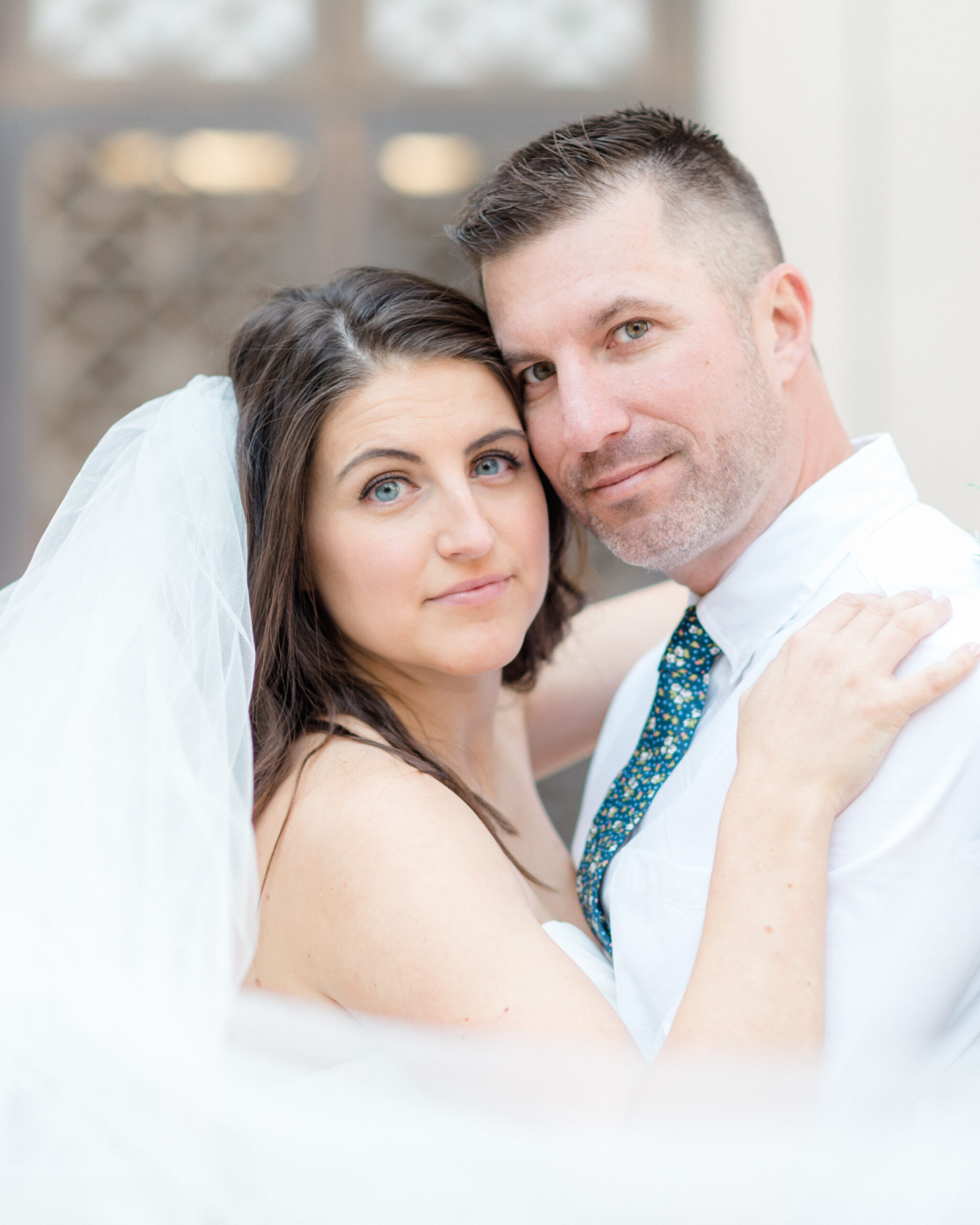 Bride and groom pose for portraits in Virginia Beach