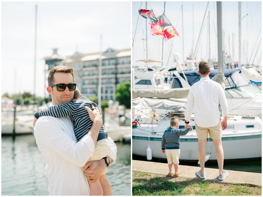 Father and son look at the boats in the harbor on a bright sunny day