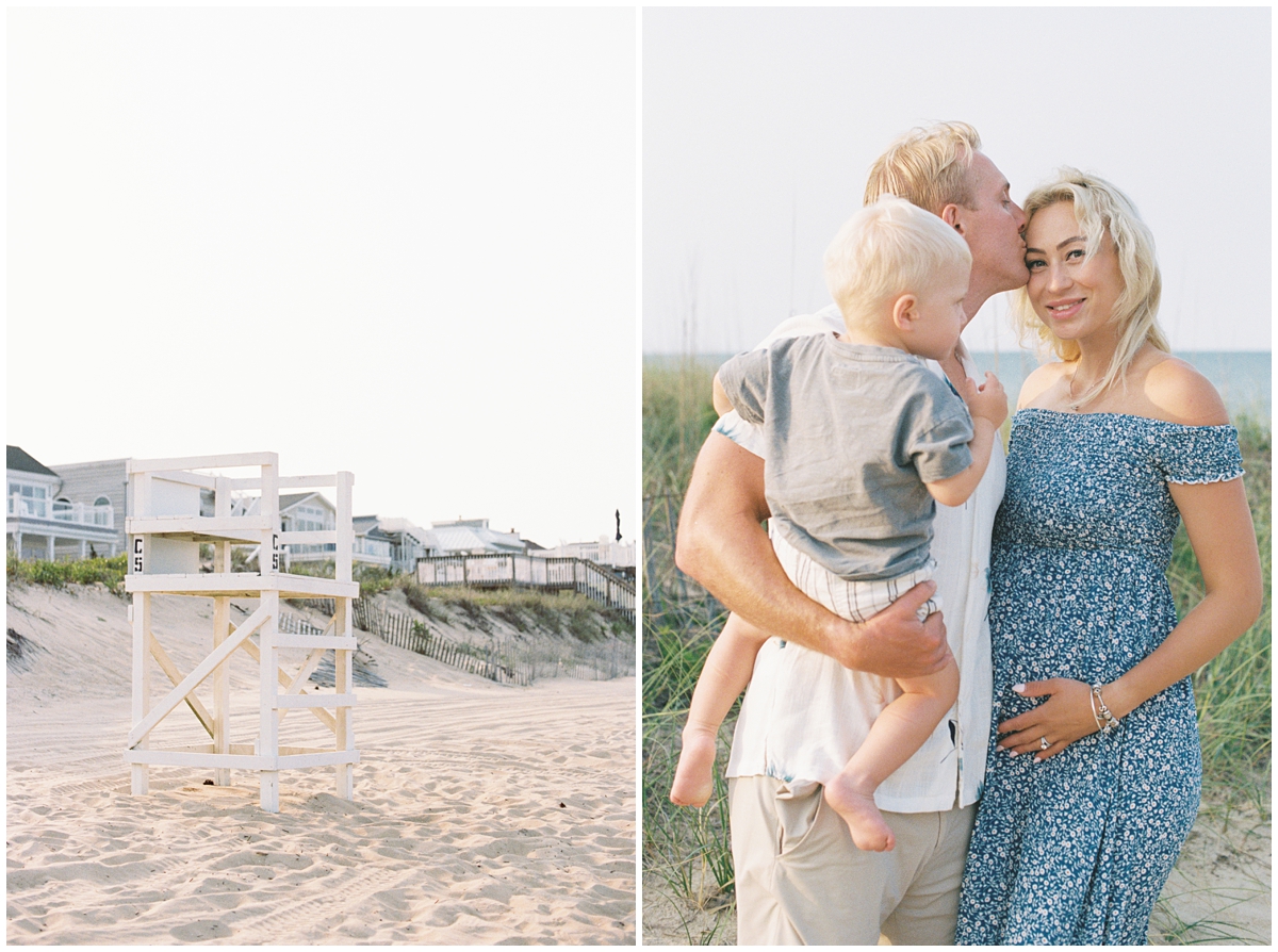Dad kissing mom during Croatan Beach family photos near the lifeguard post